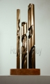 PP70, 8x8x19.5 inches, cast bronze,  cherry wood base, 1990
